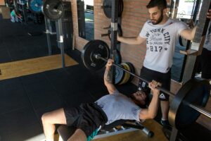 A gym is a facility designed for physical exercise and fitness activities. It typically provides a range of equipment and services to support various workout routines, such as cardiovascular exercise, strength training, and group fitness classes. Gyms offer a space for individuals to engage in structured fitness programs to improve their overall health, strength, and endurance.